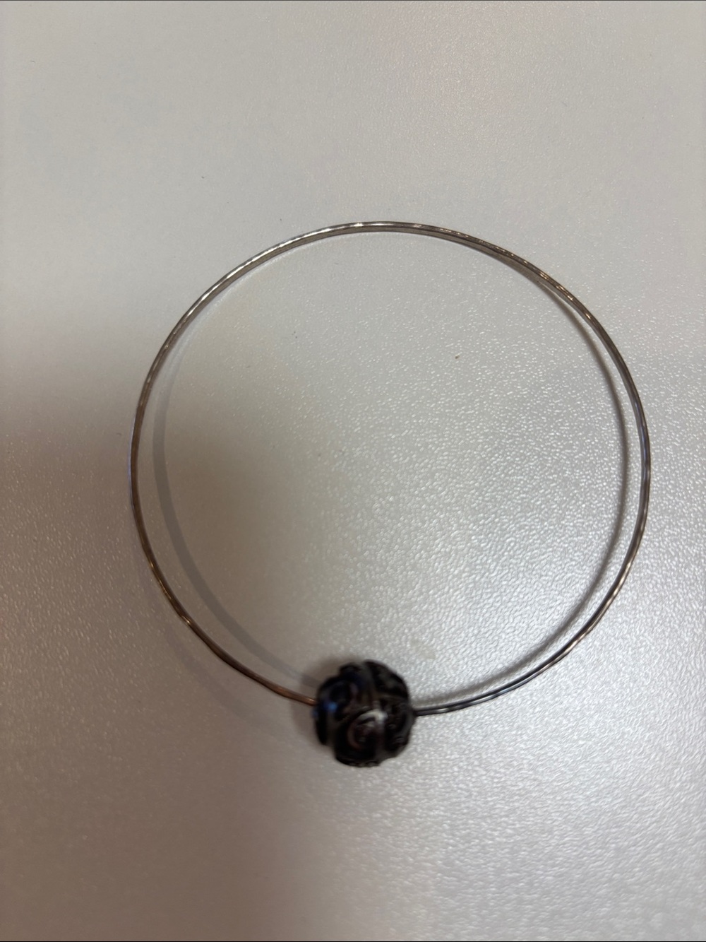 Carved Taheisha, pearl and silver bracelet